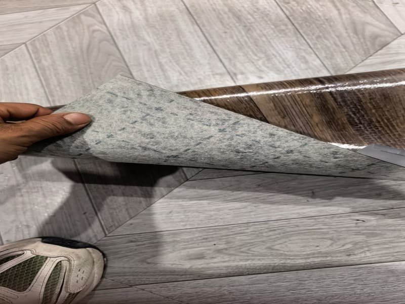 Telegraphing and cracking in vinyl sheet flooring above a concrete joint